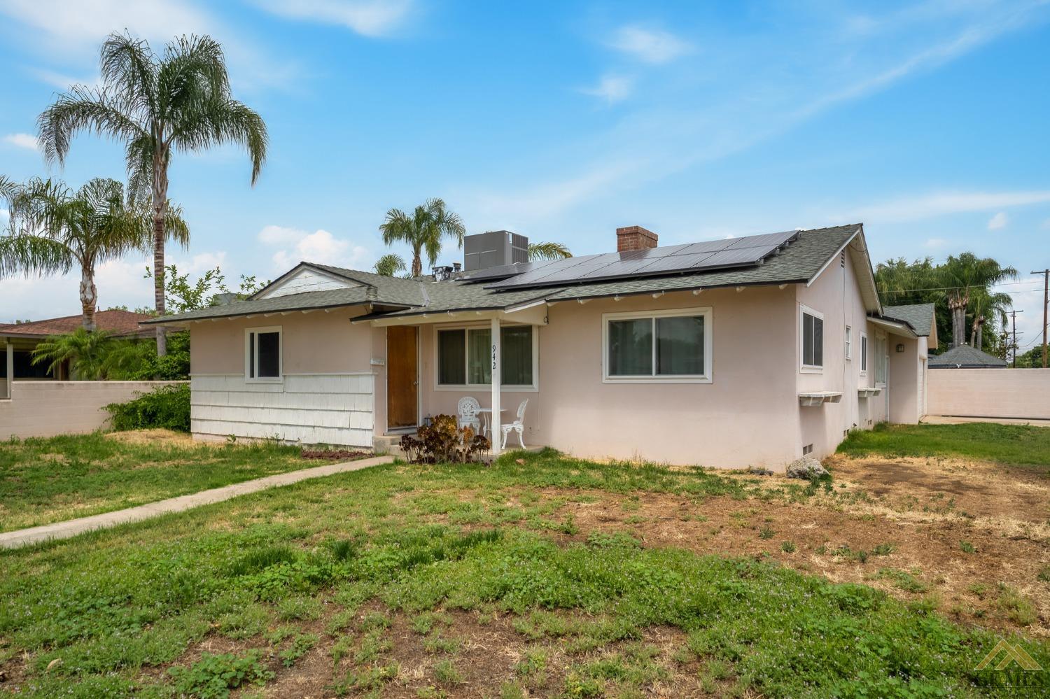 Undisclosed Address Wasco, CA 93280 - Photo 28 of 30 a view of a house with a yard