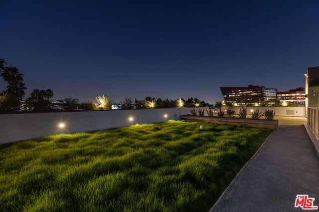 a view of a golf course with a lake