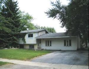 160 Bedford Road Bolingbrook, IL 60440 - Photo 1 of 1 a front view of a house with a garden and yard