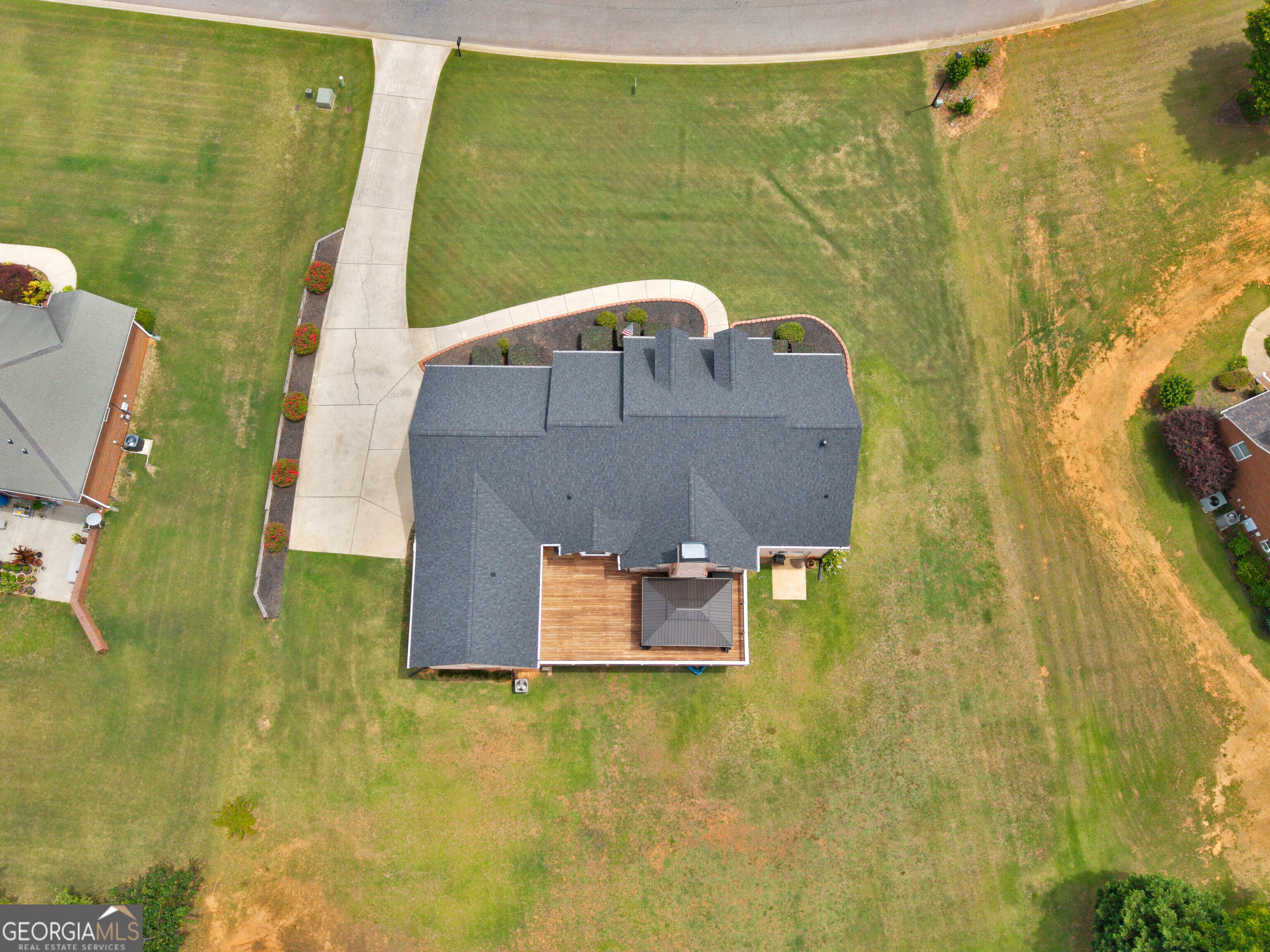 221 Hummingbird Court Hampton, GA 30228 - Photo 74 of 77 a aerial view of a residential apartment building with a swimming pool