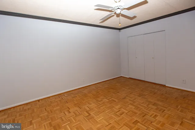 a kitchen with stainless steel appliances wooden cabinets and a sink