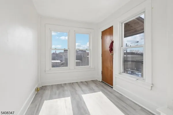 a view of hallway with windows