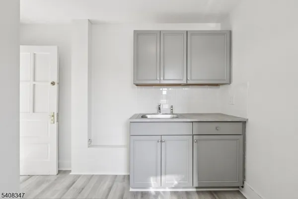 a bathroom with a sink and a vanity