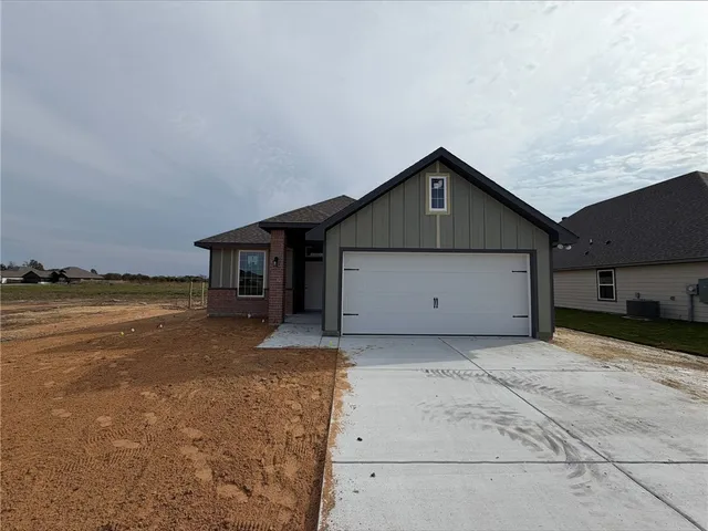a view of a house with wooden floor and a lake view