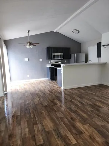 a view of a kitchen with a sink cabinets and window