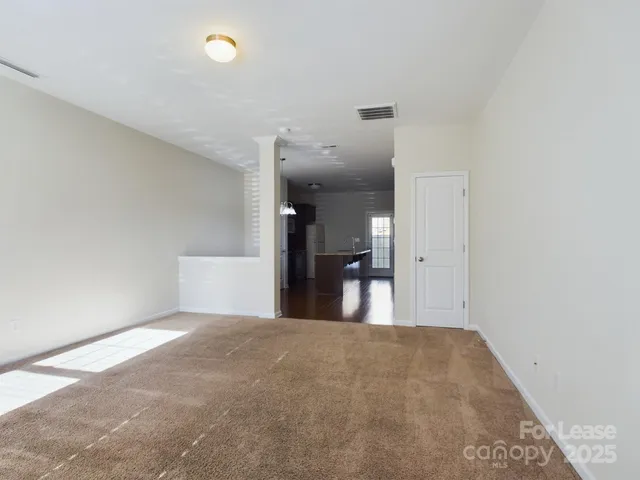 a view of a kitchen with a sink