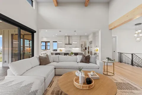 a large kitchen with stainless steel appliances granite countertop lots of white cabinets and a granite counter tops