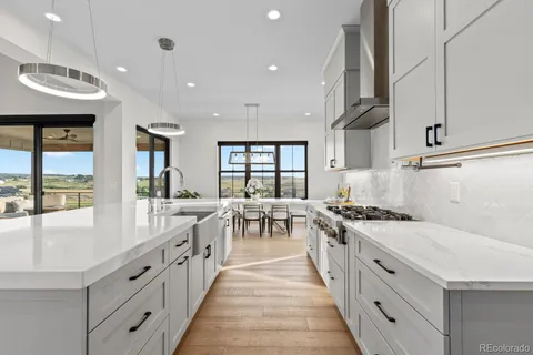 a view of a dining room with furniture and window