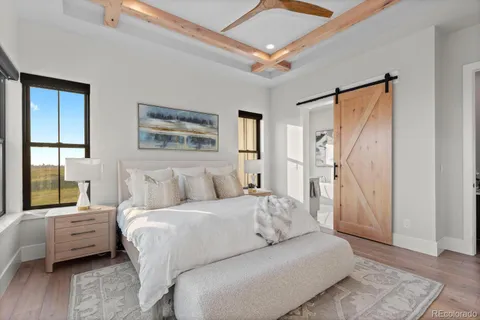 a bathroom with a sink and a large mirror