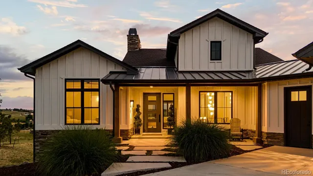a view of living room kitchen and entryway