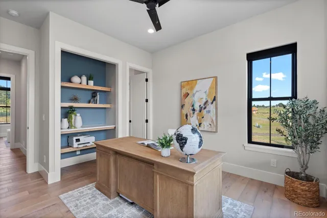 a bathroom with a toilet sink and shower