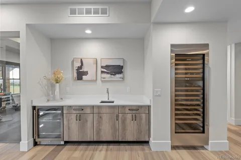 a bedroom with a large bed and a large window