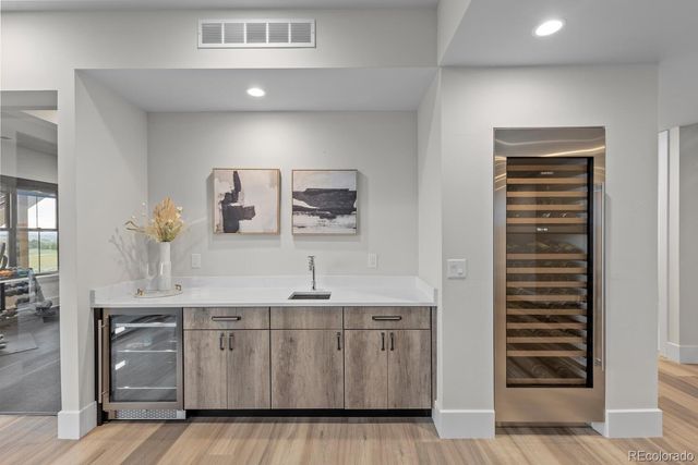 a bedroom with a large bed and a large window