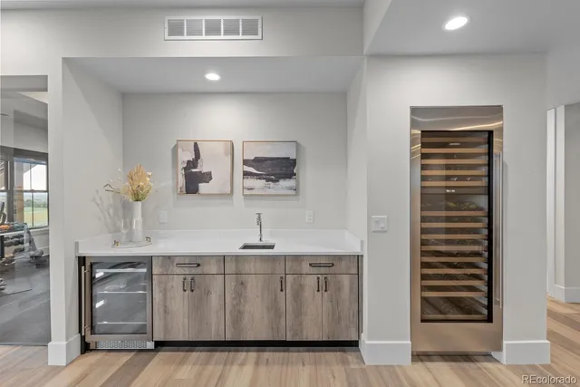 a bedroom with a large bed and a large window