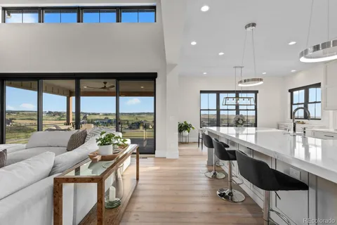 a living room with furniture fireplace and a flat screen tv