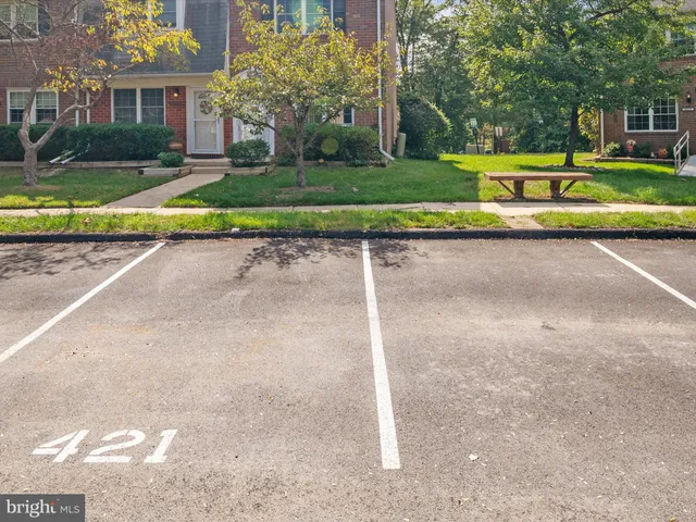 a view of backyard with green space