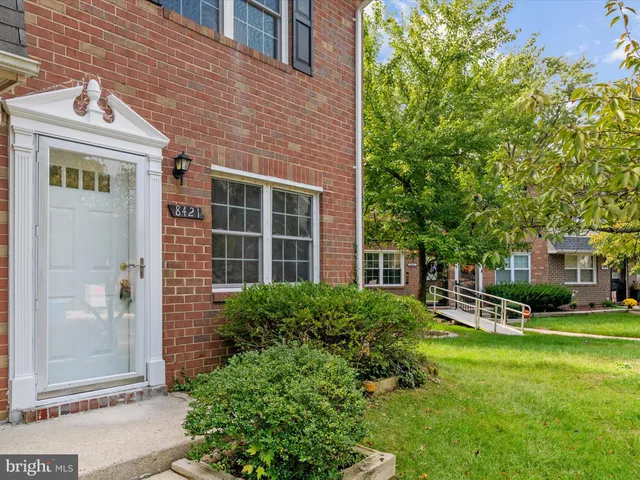 a house view with a garden space