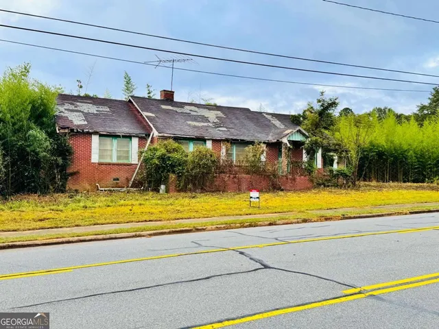 a view of a house with a swimming pool