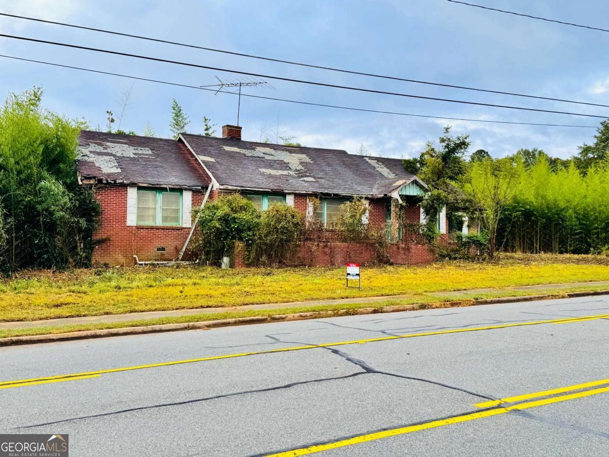 a view of a house with a swimming pool