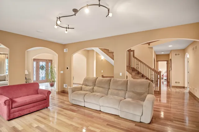 a kitchen with a stove a sink dishwasher and wooden cabinets