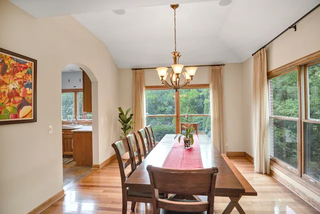 a kitchen with stainless steel appliances granite countertop a stove and a sink