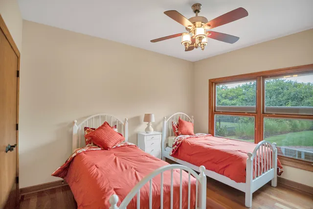 a bedroom with a bed and a fireplace