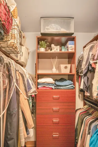a view of a living room and chandelier