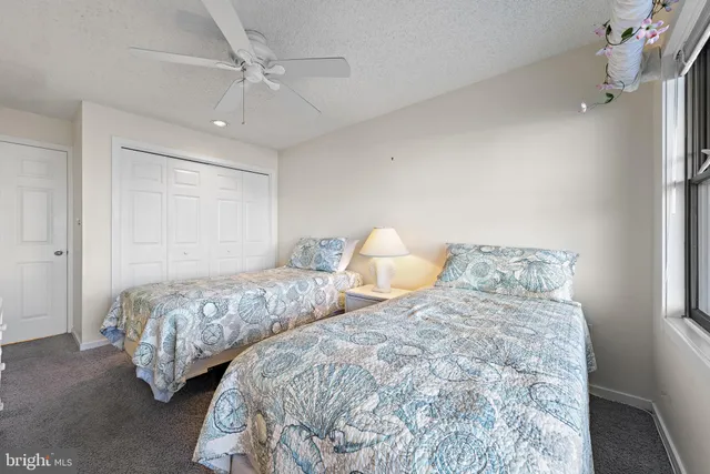 a bathroom with a sink vanity and a mirror