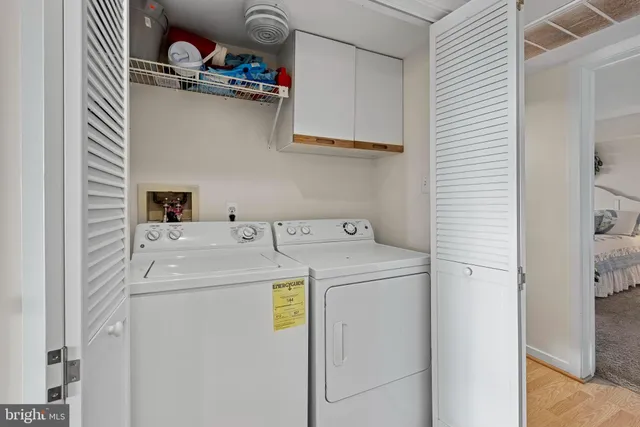 a bathroom with a shower a toilet and a sink