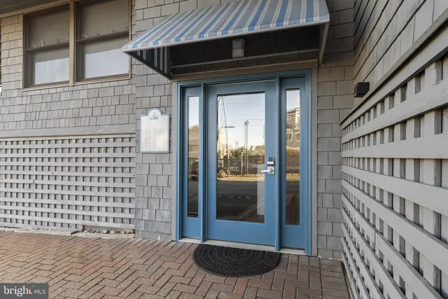 a view of a brick house with a door