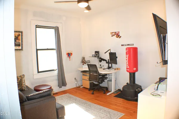 a bedroom with a bed and cabinets