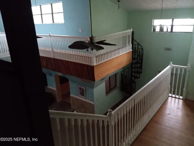an aerial view of residential house with outdoor space and swimming pool