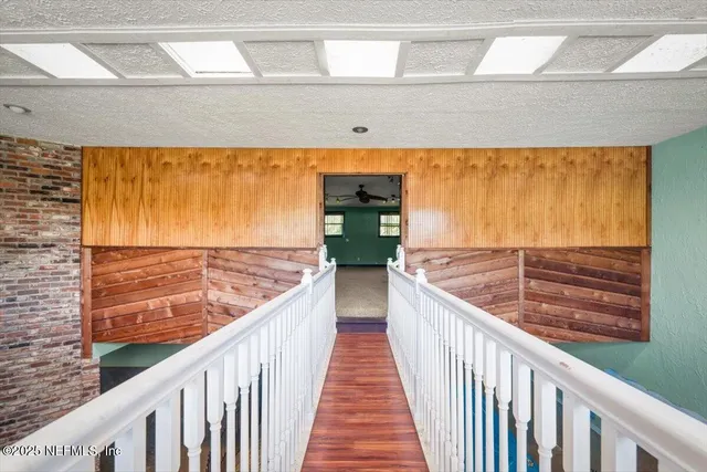 a front view of house with yard and outdoor seating