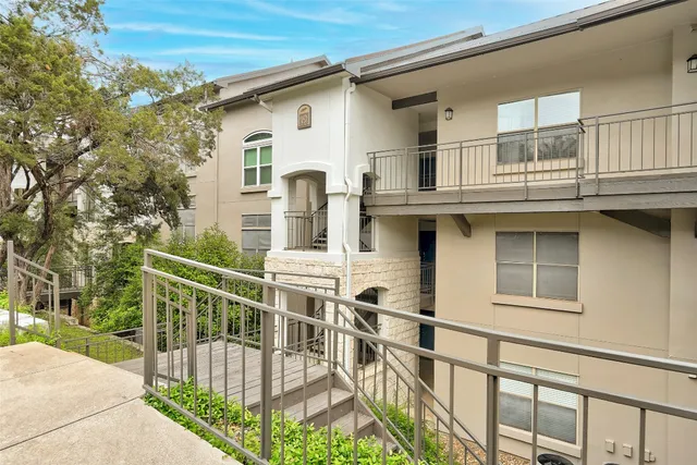 a front view of a house with balcony