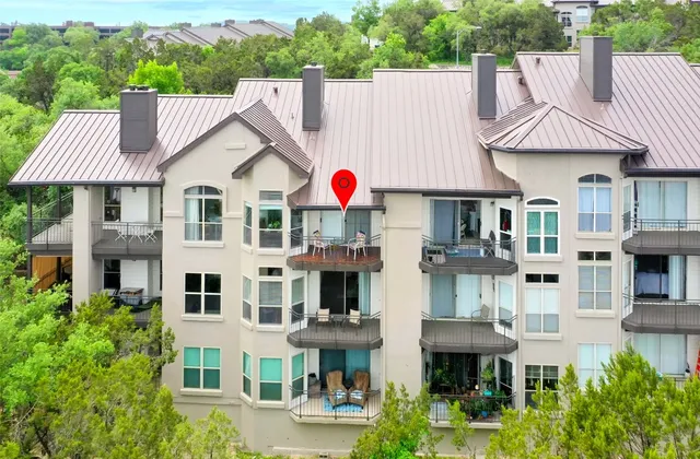 a aerial view of multi story residential apartment buildings