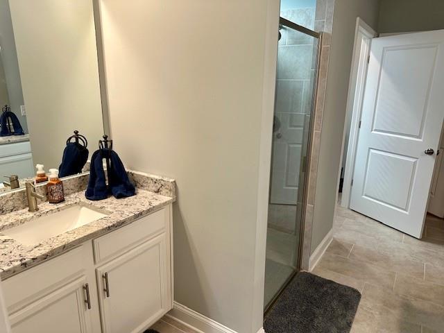 513 Forest Lane Canton, GA 30114 - Photo 33 of 78 a bathroom with a granite countertop sink and a mirror