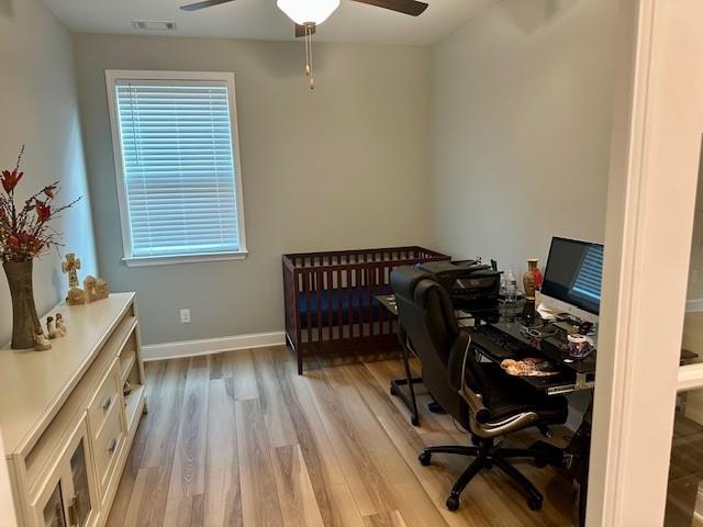 513 Forest Lane Canton, GA 30114 - Photo 36 of 78 a view of a workspace with furniture and a window