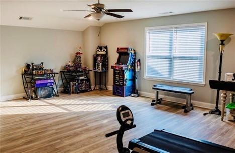513 Forest Lane Canton, GA 30114 - Photo 42 of 78 a view of a workspace with furniture and a window