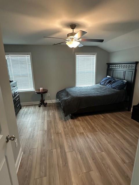 513 Forest Lane Canton, GA 30114 - Photo 47 of 78 a living room with a bed furniture and a chandelier