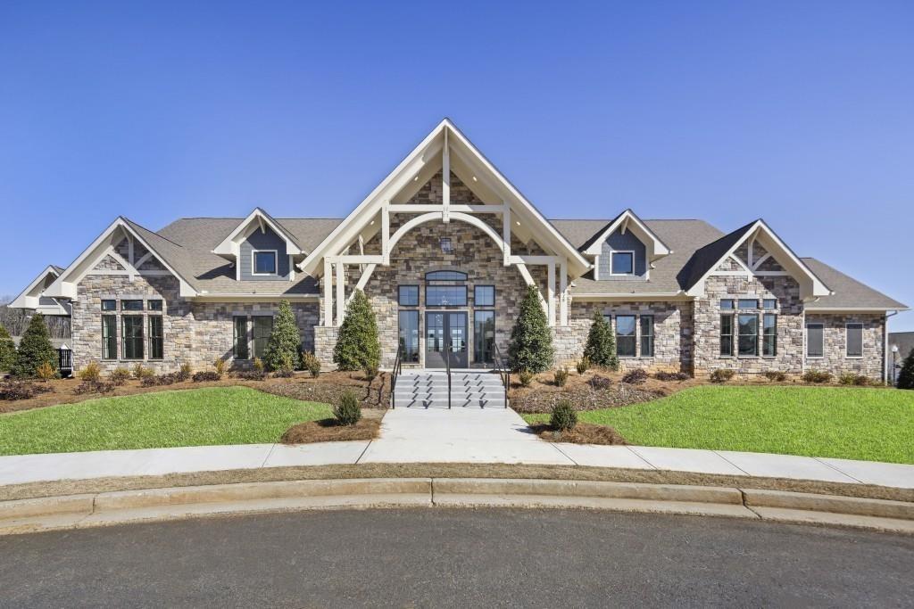 513 Forest Lane Canton, GA 30114 - Photo 57 of 78 a front view of a house with a yard