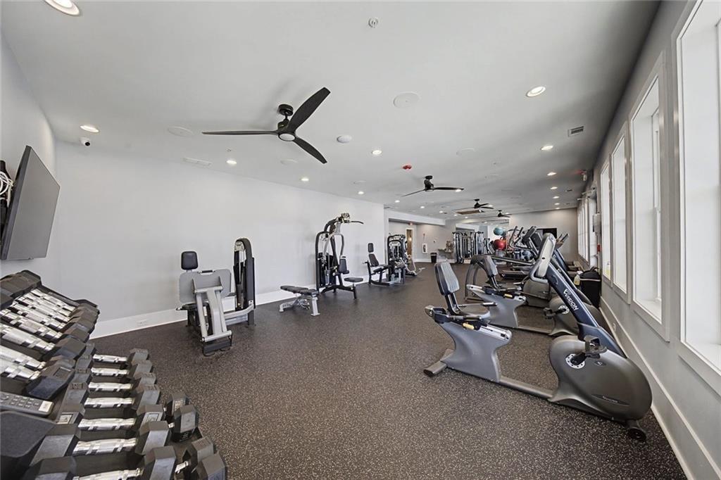 513 Forest Lane Canton, GA 30114 - Photo 74 of 78 a view of a room with gym equipment