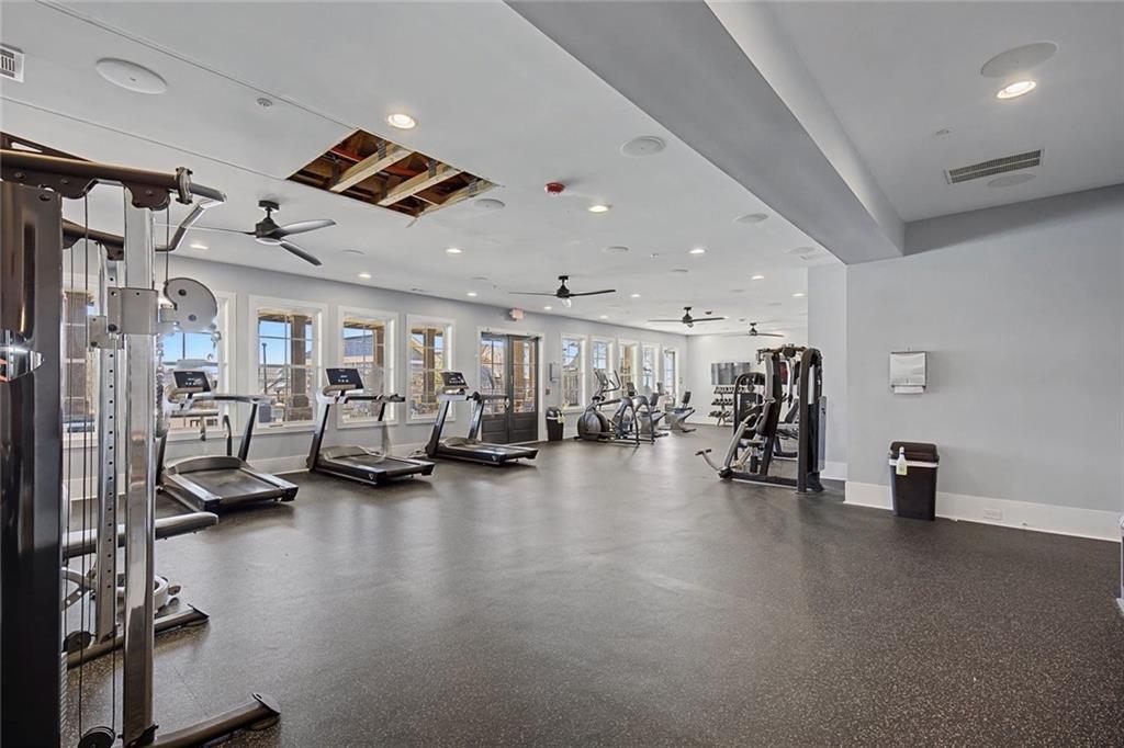 513 Forest Lane Canton, GA 30114 - Photo 75 of 78 a view of a room with gym equipment