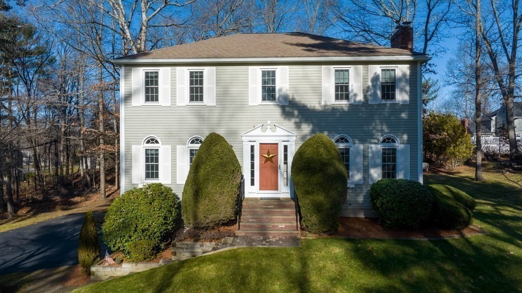 4 Camelot Circle Dudley, MA 01571 - Photo 2 of 42 a front view of a house with garden
