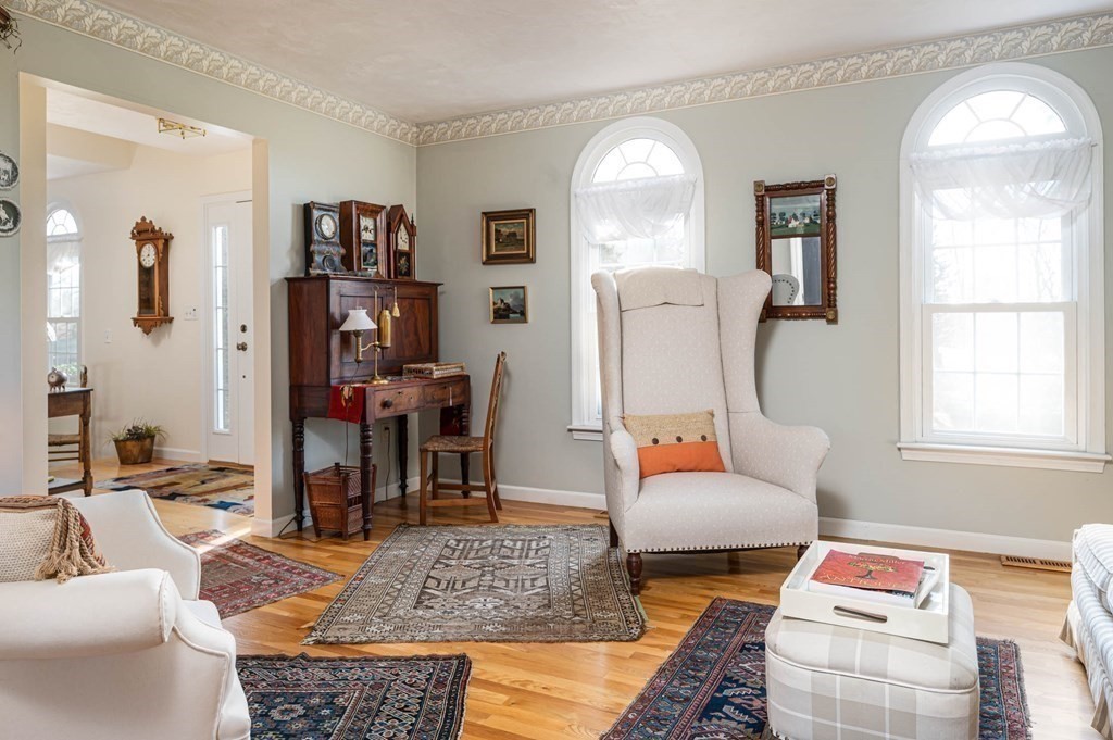 4 Camelot Circle Dudley, MA 01571 - Photo 22 of 42 a living room with furniture and a large window