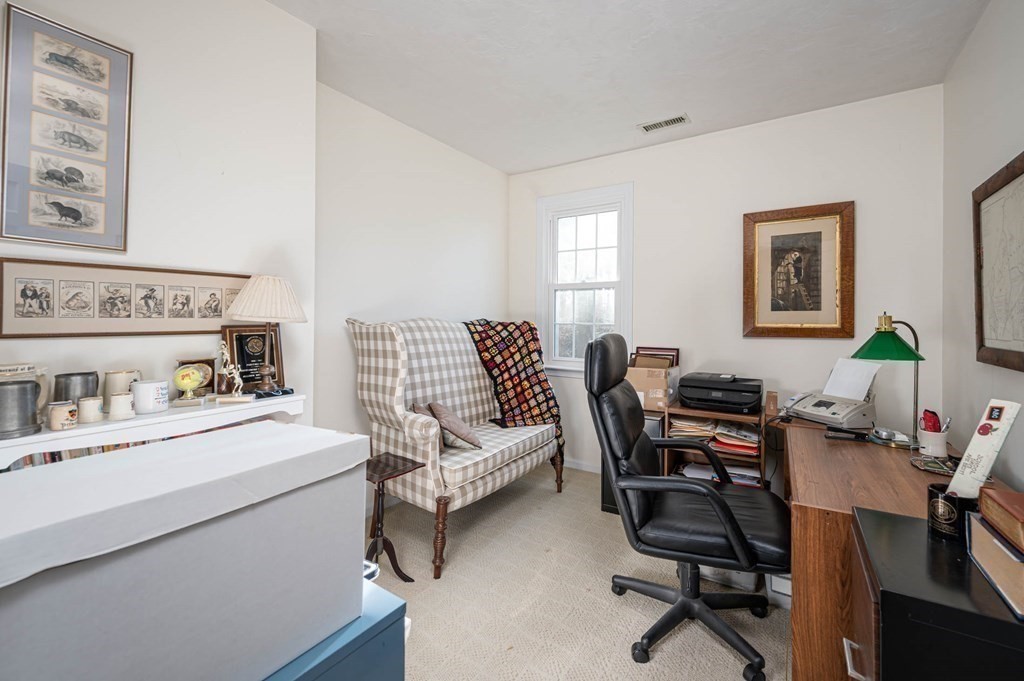 4 Camelot Circle Dudley, MA 01571 - Photo 28 of 42 a living room with furniture and a wooden floor