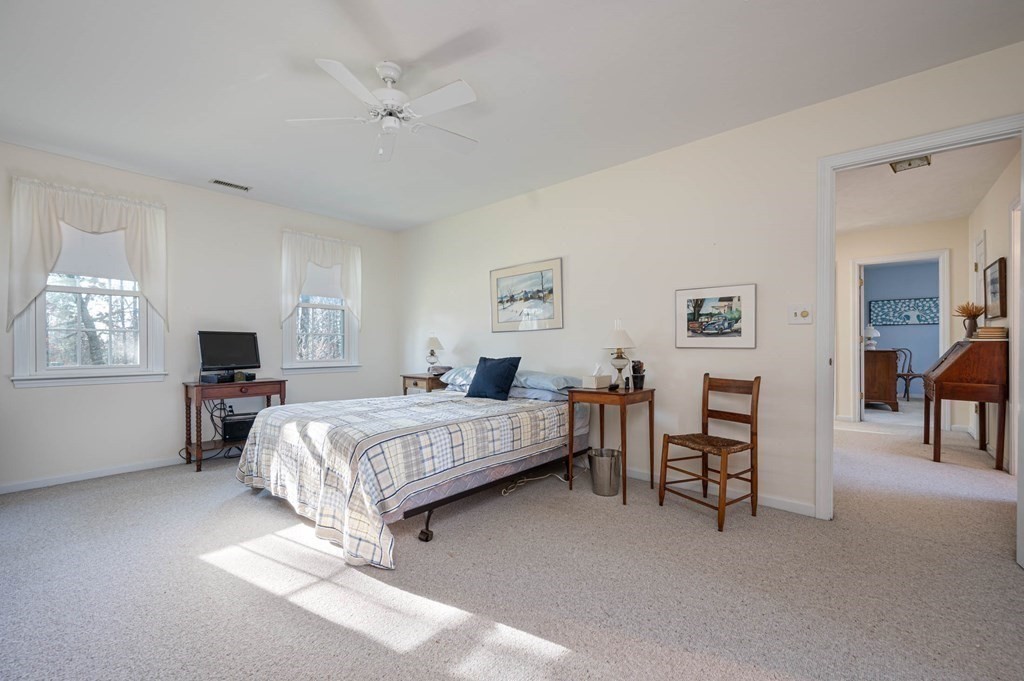 4 Camelot Circle Dudley, MA 01571 - Photo 29 of 42 a bedroom with a bed and a couch