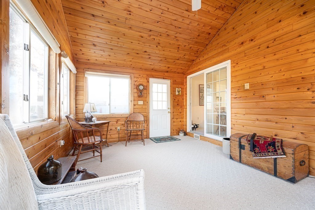 4 Camelot Circle Dudley, MA 01571 - Photo 8 of 42 a view of a livingroom with furniture and floor to ceiling window
