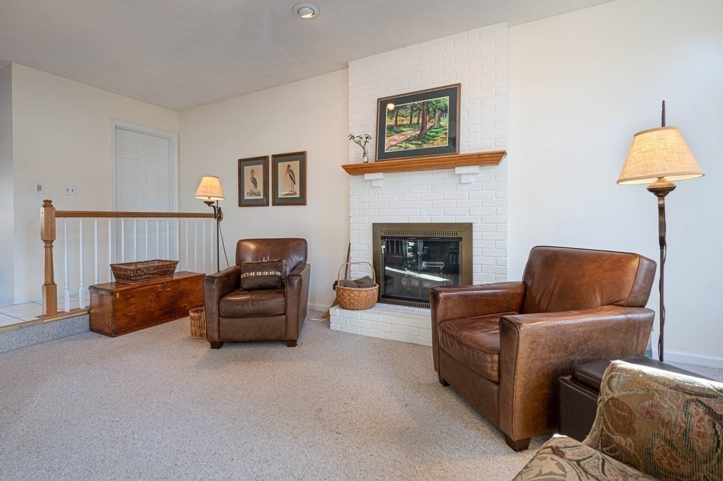 4 Camelot Circle Dudley, MA 01571 - Photo 10 of 42 a living room with furniture and a fireplace