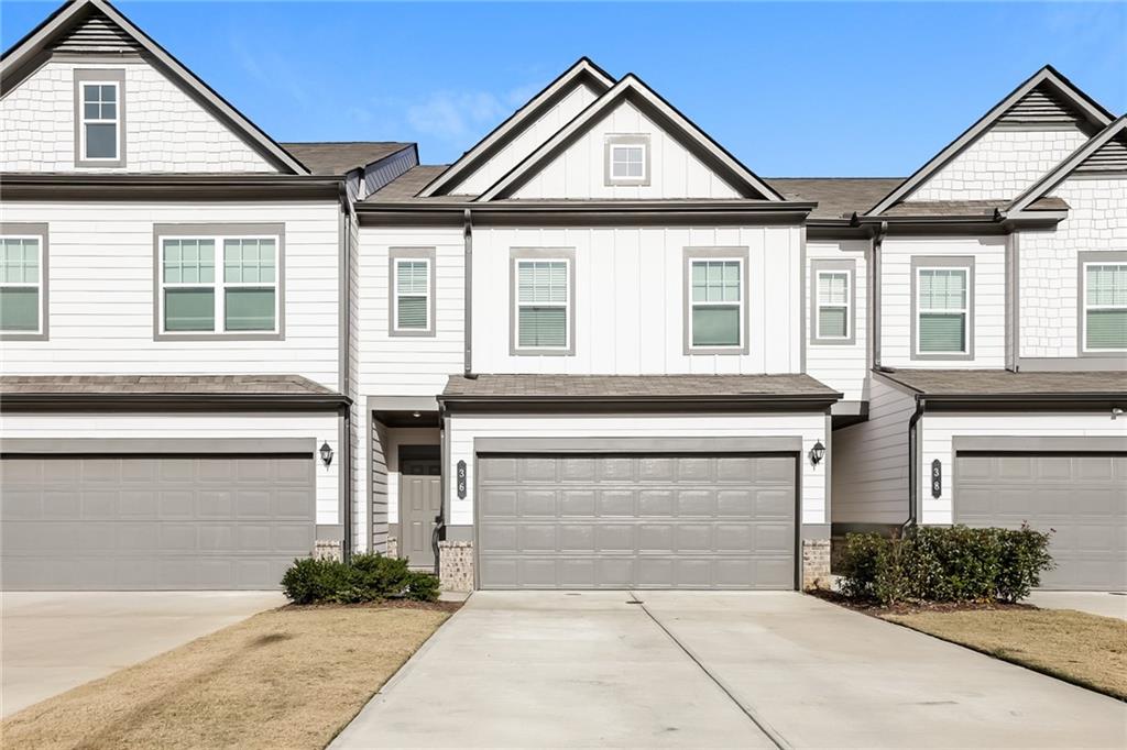 36 Felton Walk Boulevard Cartersville, GA 30120 - Photo 1 of 15 a front view of a house with garden