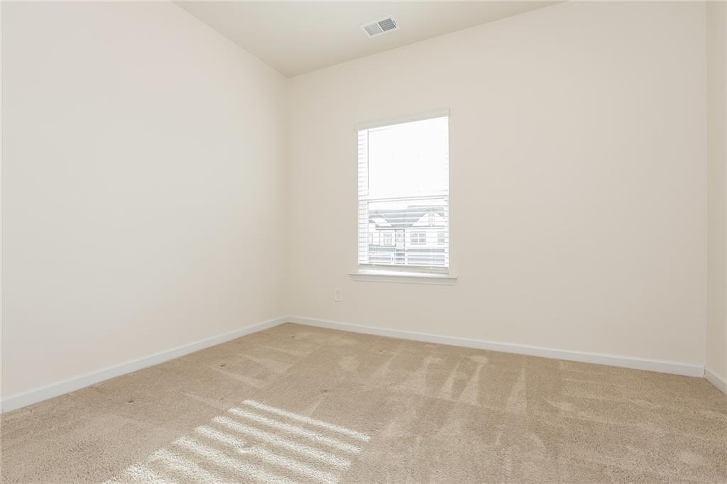 36 Felton Walk Boulevard Cartersville, GA 30120 - Photo 13 of 15 an empty room with a window